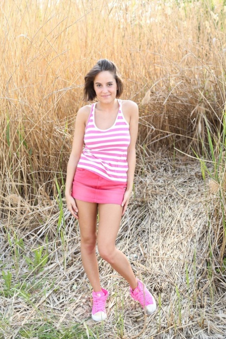 Busty teen discovers a crop circle and is powerless to resist masturbating