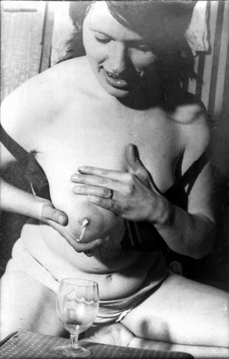 Busty model has her huge tits bound and milked in vintage BDSM session