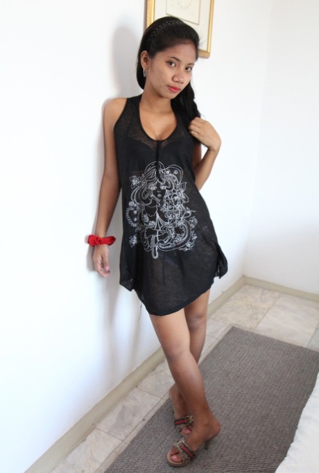 Young Asian Francine offers a sheer panty upskirt & closeup of huge nipples
