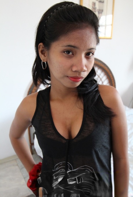 Young Asian Francine offers a sheer panty upskirt & closeup of huge nipples