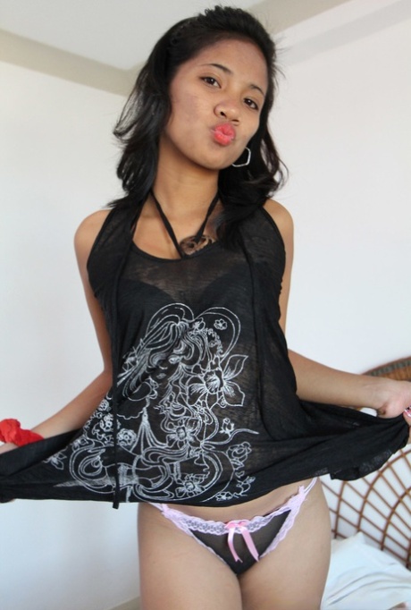 Young Asian Francine offers a sheer panty upskirt & closeup of huge nipples