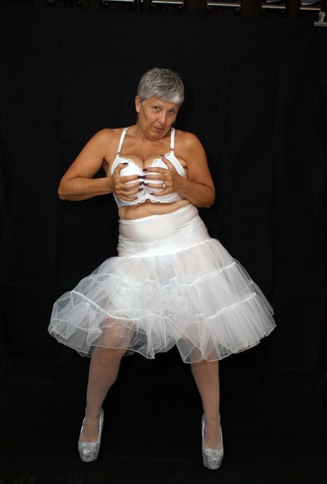 Brazen plump granny Savana flashes panty upskirt in tutu & sparkly high heels