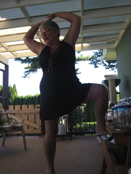 Old lady Girdle Goddess shakes her big butt while on a veranda