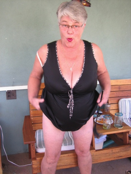 Old lady Girdle Goddess shakes her big butt while on a veranda