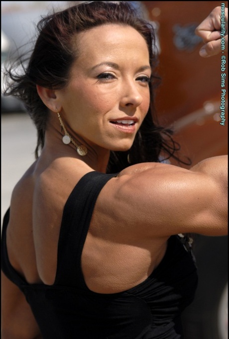 Bodybuilder Patricia Beckman flexes in swimwear and a little black dress too