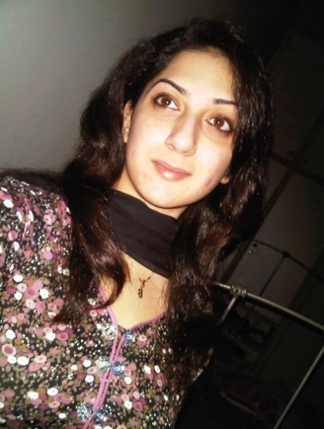 Indian solo girl takes self shots of her big natural tits