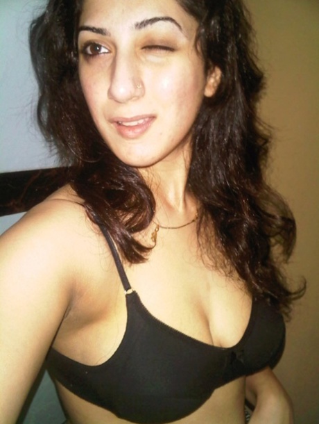 Indian solo girl takes self shots of her big natural tits
