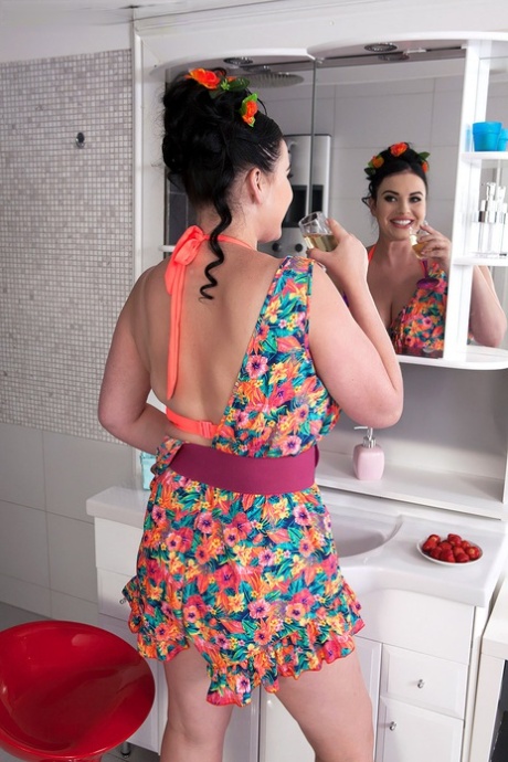 BBW Tina Lee eats strawberries before showing her huge boobs in bathroom