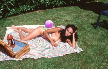 Indian MILF frees her nice boobs from swimwear in a backyard