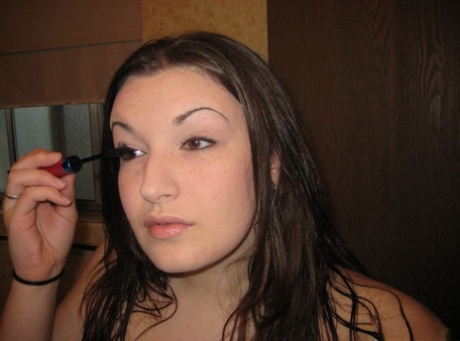 Thick amateur takes nude selfies after showering in a safe for work manner