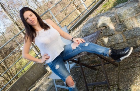 Solo girl Talia Amanda pulls out her knockers while wearing ripped jeans