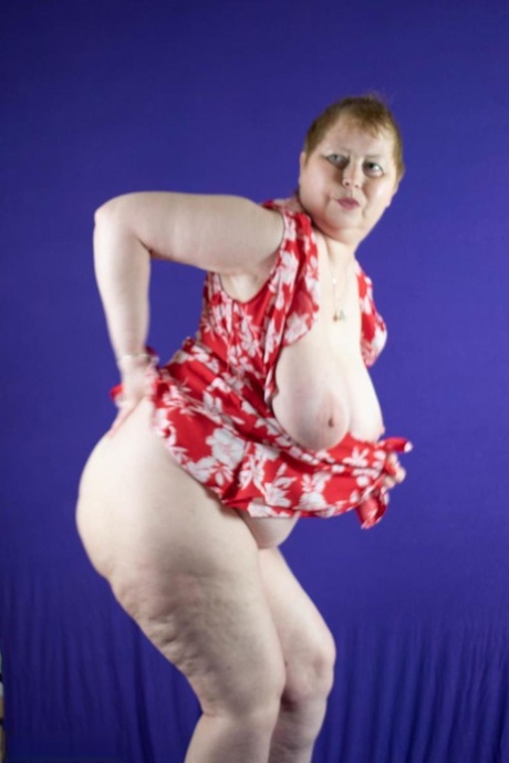Fat older woman Posh Sophia fondles her huge boobs after getting bare naked