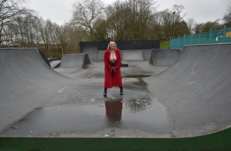 Older blonde exhibitionist Barby Slut exposes herself while at a public park