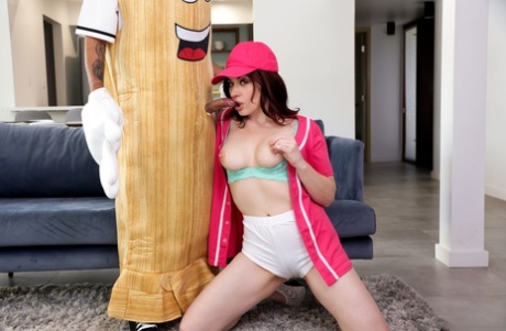 Jessica Ryan has sex with her costume attired stepson on a sofa