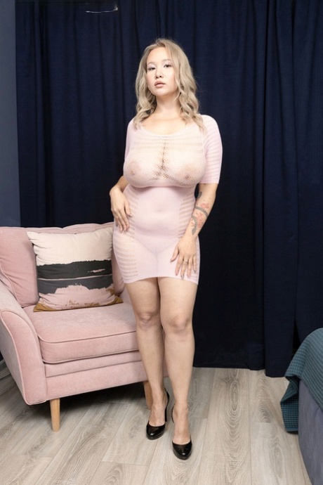 Sexy MILF Katie Rose unleashes her giant breasts during a solo performance
