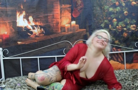 Tattooed UK blonde Mollie Foxxx looses her tits and ass from a red robe