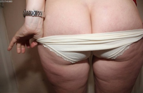 Blonde British woman Tracey Lain peels of white underwear before POV sex