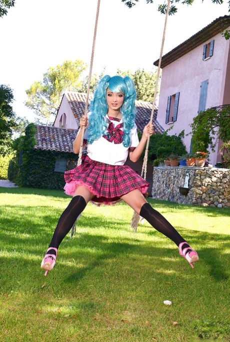 Cosplaying hottie Lucie Wilde shows off her massive hooters outside
