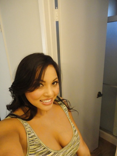 Brunette chick Adriana Luna taking nude selfies in mirror while undressing