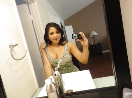 Brunette chick Adriana Luna taking nude selfies in mirror while undressing