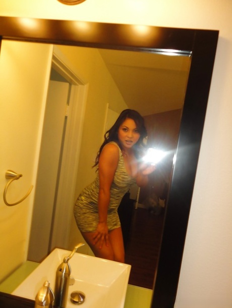 Brunette chick Adriana Luna taking nude selfies in mirror while undressing