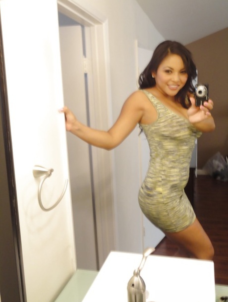 Brunette chick Adriana Luna taking nude selfies in mirror while undressing