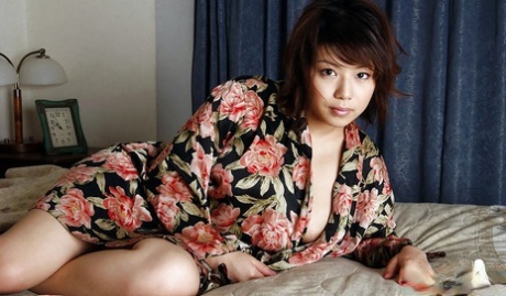 Asian teen babe with big tits Mai Haruna stripping and posing naked