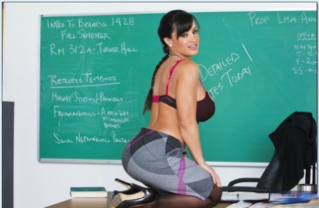 Hot teacher Lisa Ann brings out her MILF boobs and posing in stockings