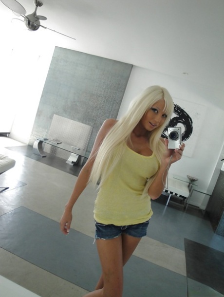 Blonde hottie with big tits Rikki Six stripping and picturing herself
