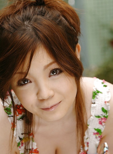 Bosomy asian babe Nami Ogawa slowly getting rid of her clothes