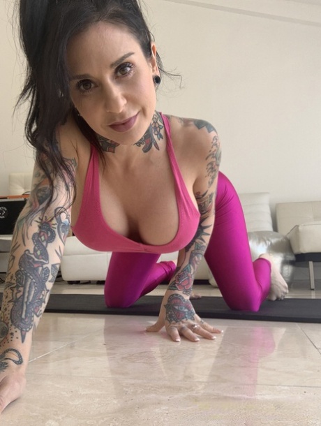 Tattooed MILF pornstar Joanna Angel displays her big tits and gets fucked hard