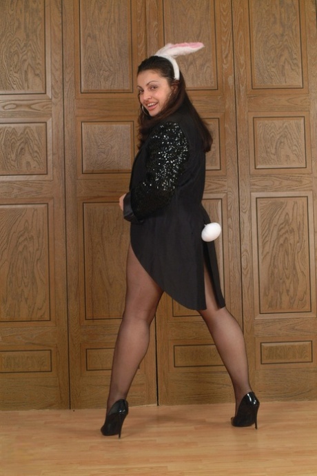 Amateur mom in bunny ears Claudia unveils her big tits & toys in pantyhose