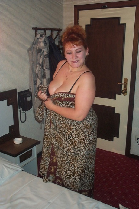 Chubby mature Iris lets out her big tits and takes two hard dicks