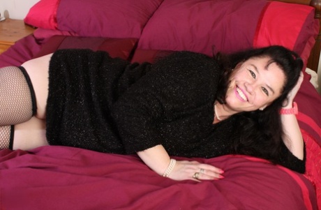 Smiley chubby woman Crystal spreads and toys her hairy cunt up close