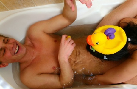 Brunette teen Gela B. enjoying hardcore doggystle sex in a bathtub