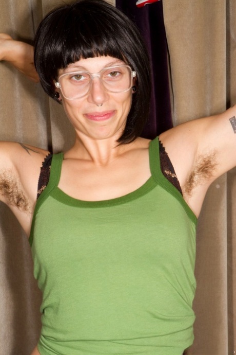 Sexy dark haired chick Saffron poses in lingerie and shows her hairy twat