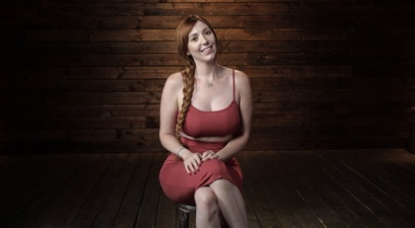 Voluptuous redheaded MILF Lauren Phillips gets tied up and toyed on a table