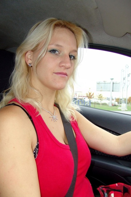 Blonde babe with big tits Sweety B strips and touches her cunt in a car