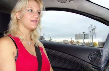 Blonde babe with big tits Sweety B strips and touches her cunt in a car