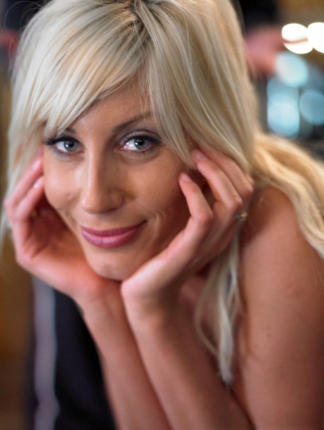 Blonde cougar with huge fakes Puma Swede gets rammed by her fitness trainer