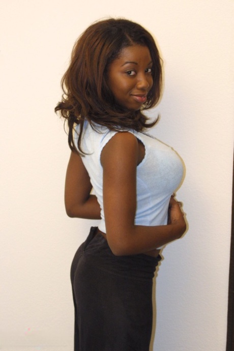 Ebony damsel Audrey James shows off her big tits & a cumshot on her cute face