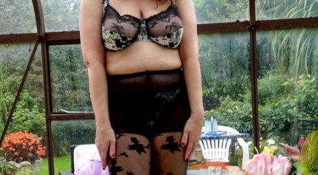 Big boobed granny EvaN strips and moans while toying her fat vagina