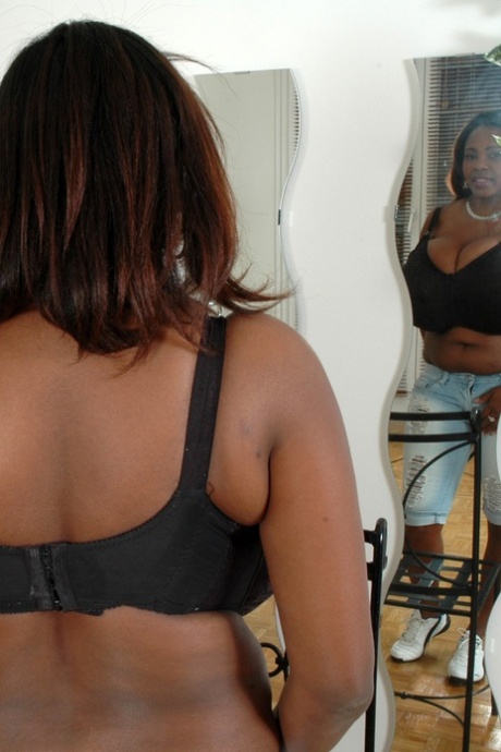 Amateur ebony Miosotis Claribel lets out her monster melons and poses nude