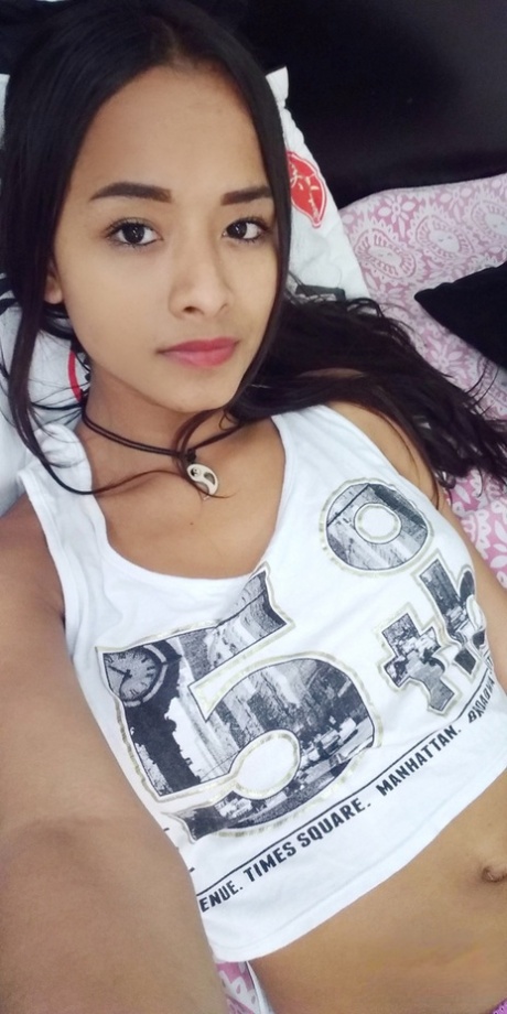 Marvelous Latina teen Liloo takes selfies of her sexy tits, pussy and feet