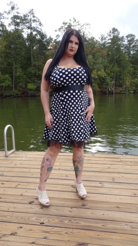 Dark haired chubby model Mischievous Kitty flashes her undies in a solo