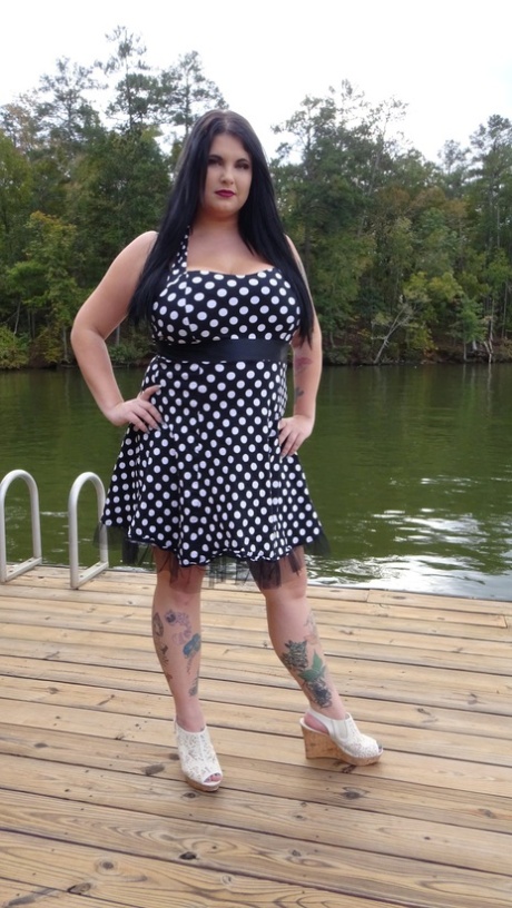 Dark haired chubby model Mischievous Kitty flashes her undies in a solo