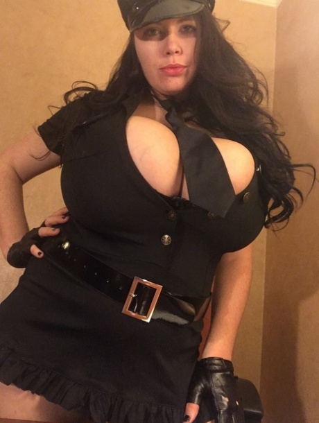 Chubby policewoman Lovely Lilith shows off her big boobs & her great ass