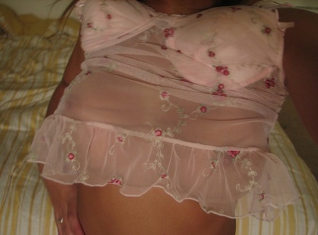 Gorgeous amateur flashes her juicy tits & her navel piercing in lingerie