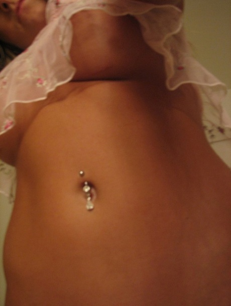 Gorgeous amateur flashes her juicy tits & her navel piercing in lingerie