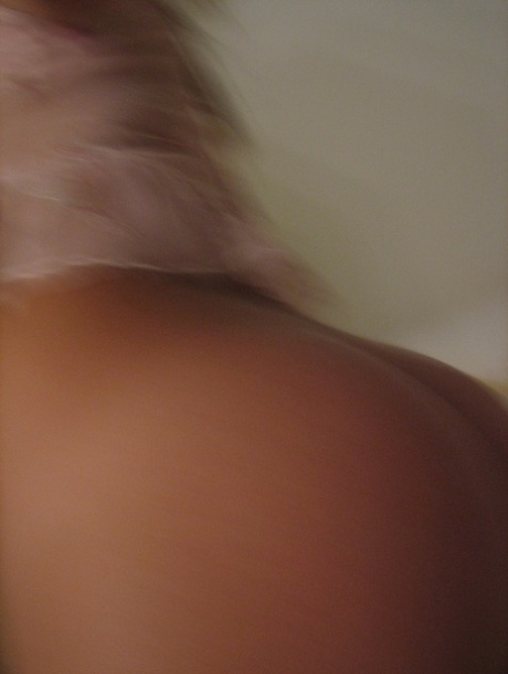 Gorgeous amateur flashes her juicy tits & her navel piercing in lingerie
